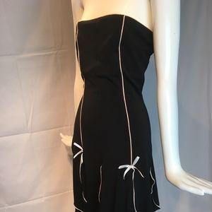 strapless ,knee length, ruffles & accents